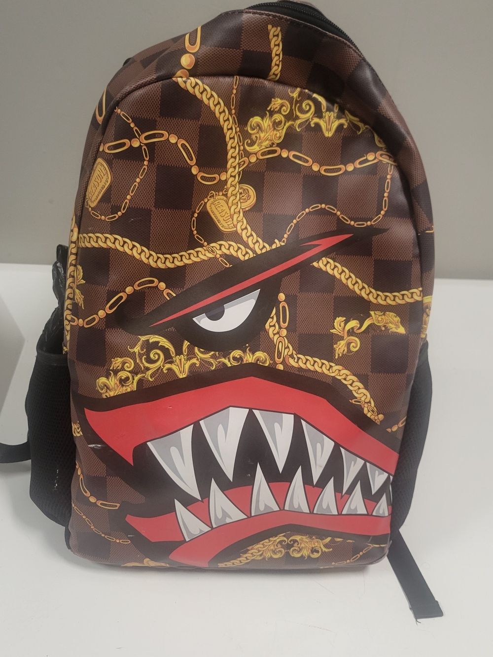Reason Clothing Shark Mouth Brown Graphic Backpack with Red Accent